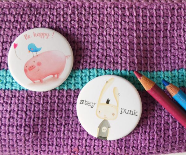 Two illustrated pins Pig and punk